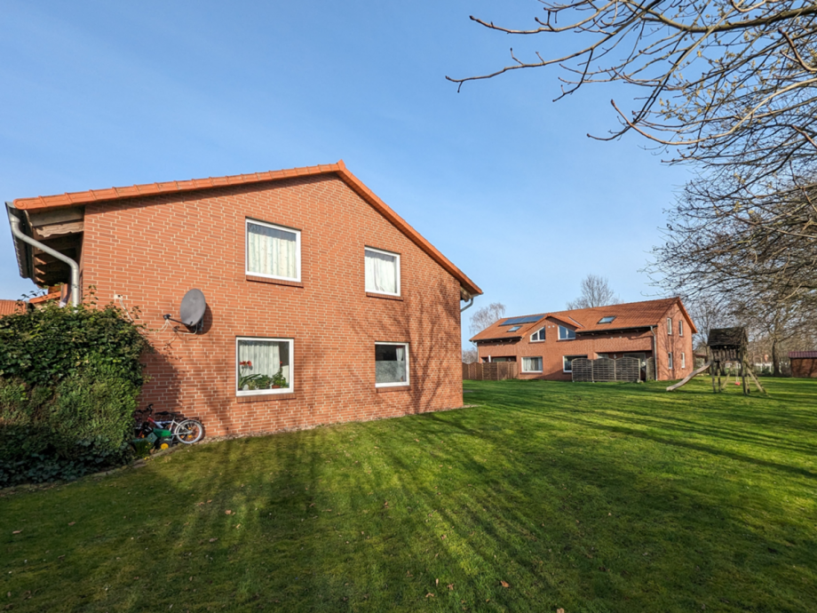 Gartenansicht beider H�user Mehrfamilienhaus Petershagen