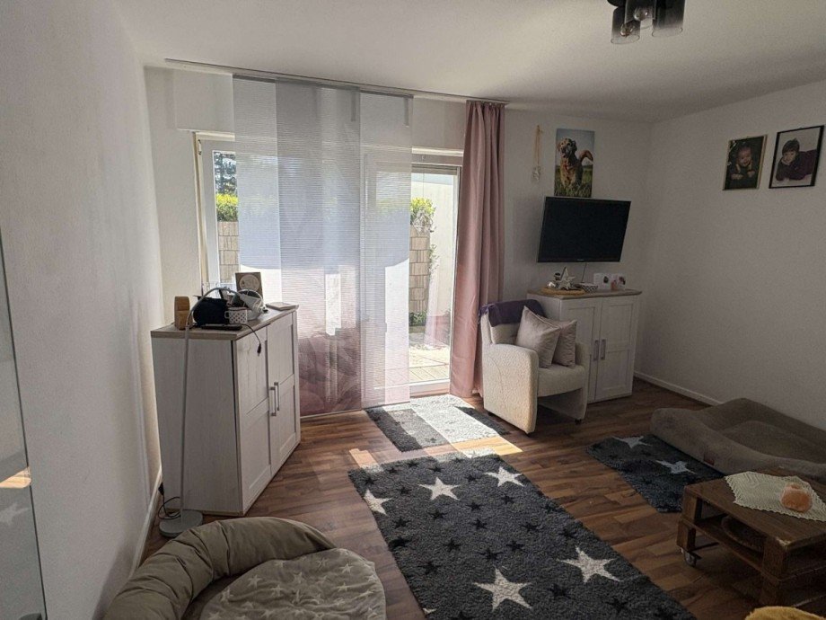 Wohnzimmer mit Zugang zur Terrasse Erdgeschosswohnung L�hne